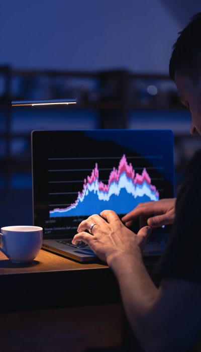 Business man stock exchange trader broker looking at screen. Investor manager analyzing financial chart. Trading online investment data price crypto currency market graph.